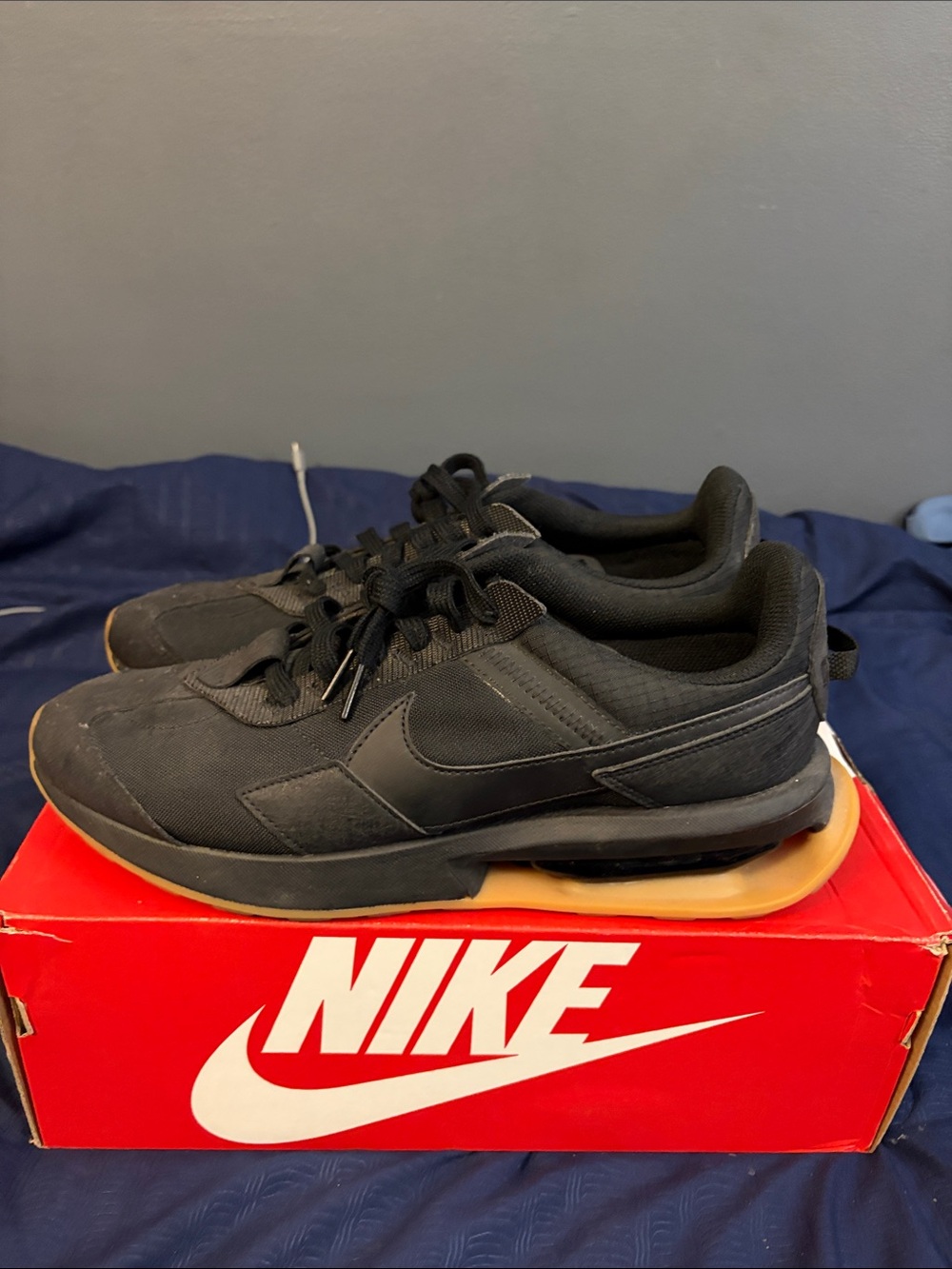 Nike Men’s Black Sneakers with Gum Accent Sole
